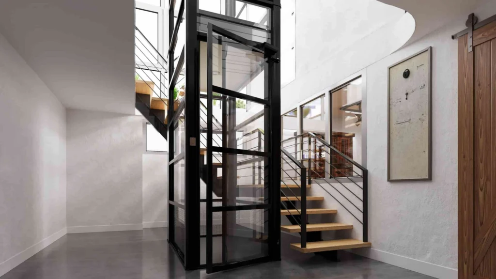 Black Cube Lift home elevator beside modern staircase in a contemporary home