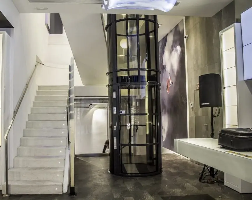 PVE52 pneumatic vacuum elevator installed in a modern multi-level home in Florida