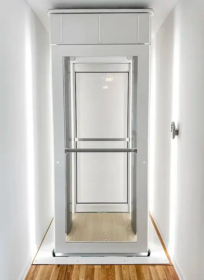 Compact Savaria Luma Lift through-floor residential elevator designed for a small space in a Florida home