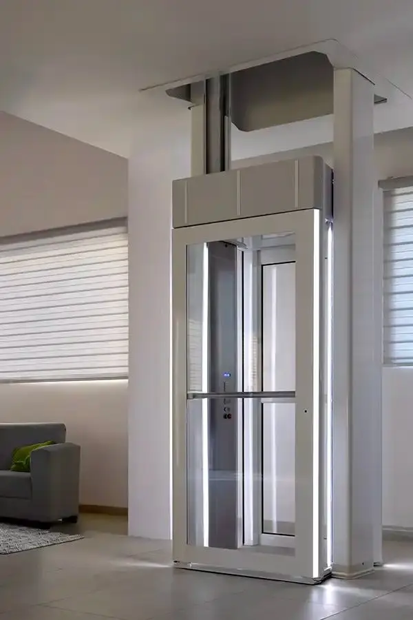 Savaria Luma Lift through-floor home elevator with illuminated white frame installed in a Florida residence