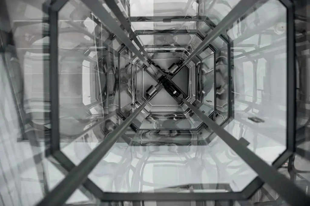 Interior shaft view of a Savaria VueLift acrylic residential elevator installed in Florida
