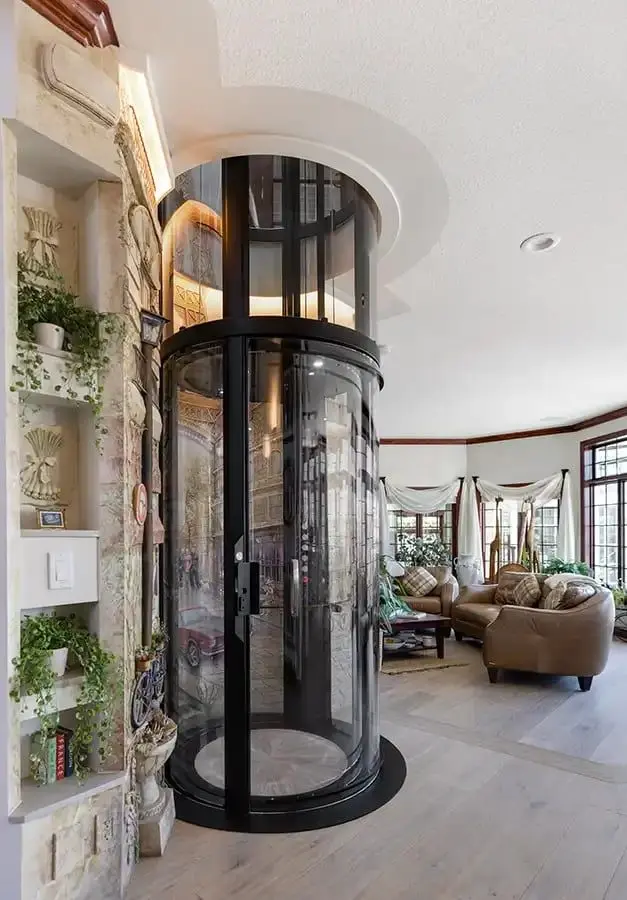 Black Savaria VueLift Mini panoramic home lift integrated into a residential living space in Florida