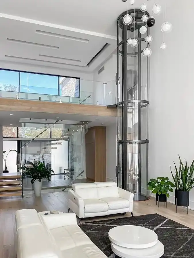 Savaria VueLift Mini panoramic residential elevator installed in a modern luxury Florida home